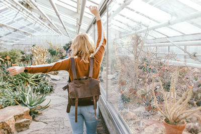 Girl dancing in a botanical garden