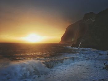 Scenic view of sea against sky during sunset