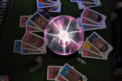 High angle view of illuminated lighting equipment on table at home