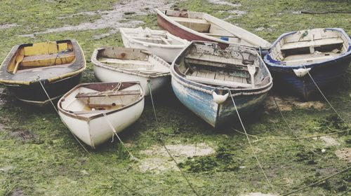 Abandoned boats moored outdoors