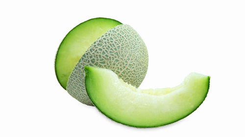 Close-up of lemon against white background