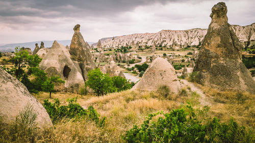 Panoramic view of landscape against cloudy sky