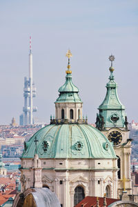 View of buildings in city against sky