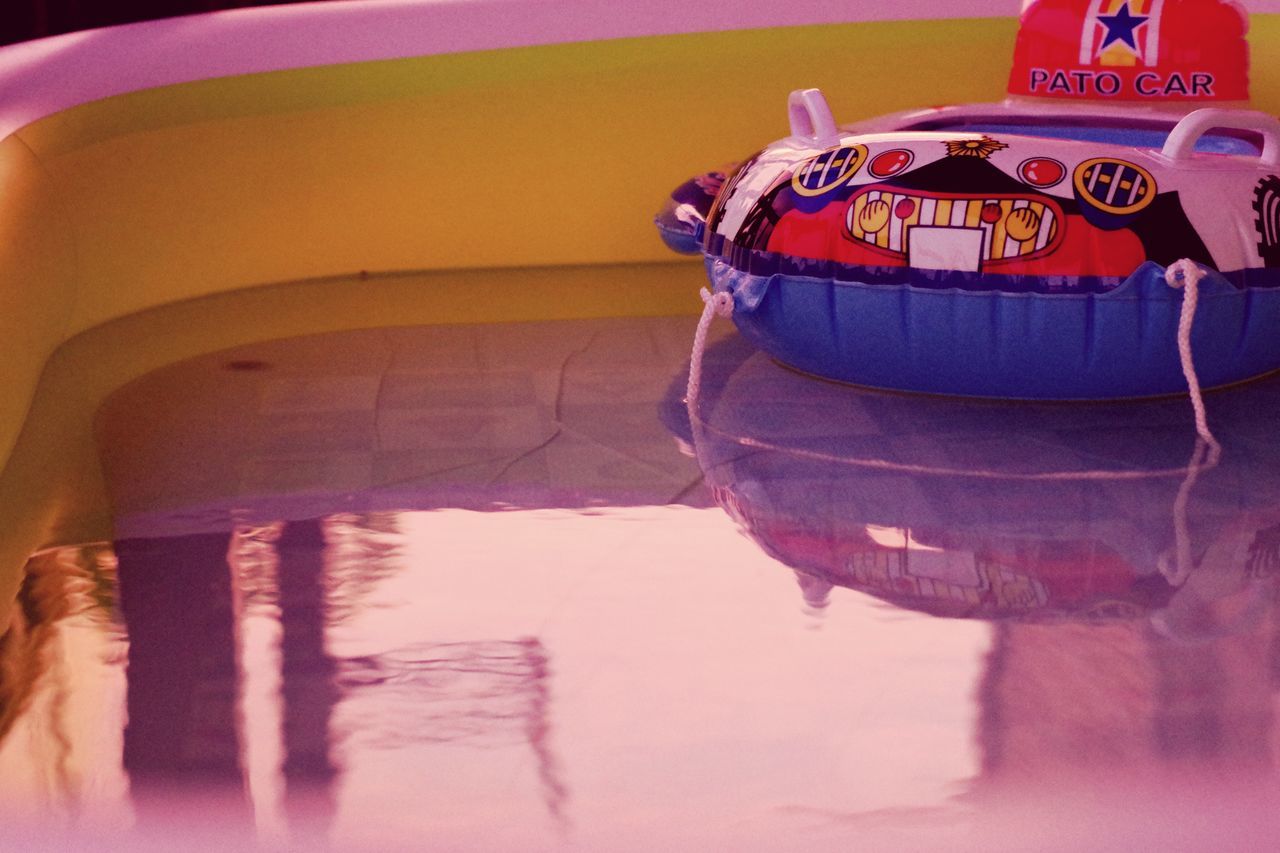 no people, water, amusement park, outdoors, nautical vessel, day, close-up, carousel