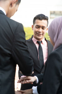 Young couple standing outdoors