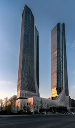 Low angle view of modern buildings against sky