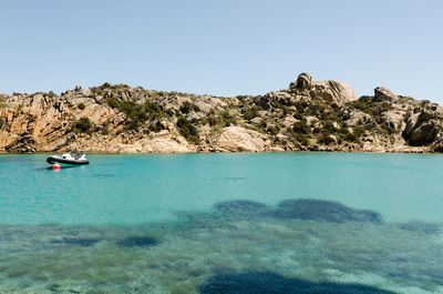 Scenic view of sea against clear sky