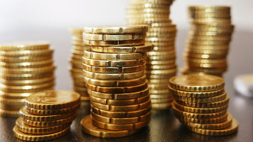 Close-up of coins on table