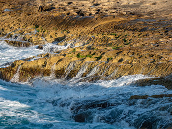 Scenic view of rocks in sea