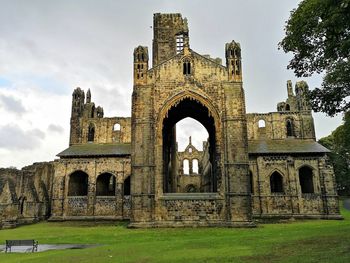 Old ruins of building against sky