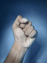 Close-up of person hand holding ice cream