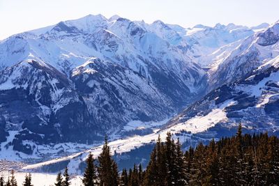 Scenic view of snowcapped mountains against sky