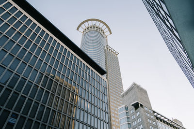 Low angle view of modern buildings against clear sky