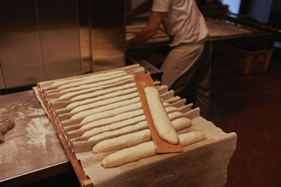 Close-up of baguettes preparing 