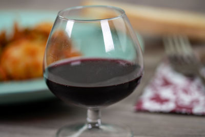 Close-up of beer glass on table