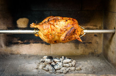 Close-up of meat on barbecue grill