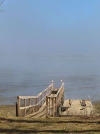 View of horse on beach against sky