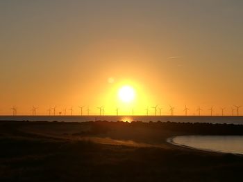 Scenic view of silhouette landscape against sky during sunset