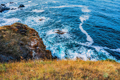 High angle view of rocks on beach