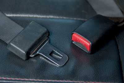 Close-up of seat belt in car