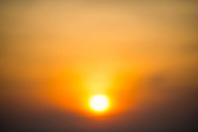 Defocused image of dramatic sky during sunset