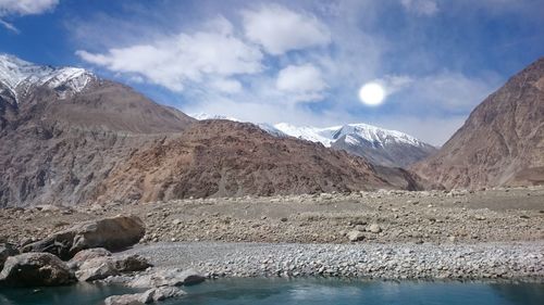 Scenic view of snowcapped mountains against sky