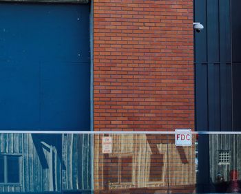 Road sign against blue door