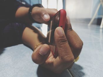 Close-up of woman holding hands
