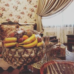 Close-up of fruits on table at home