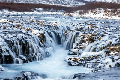 Scenic view of waterfall in winter