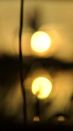 Close-up of illuminated lights at night