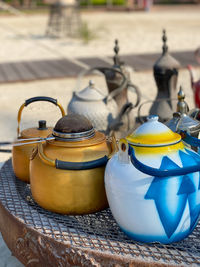 Traditional kettles serving karak chai in abu dhabi