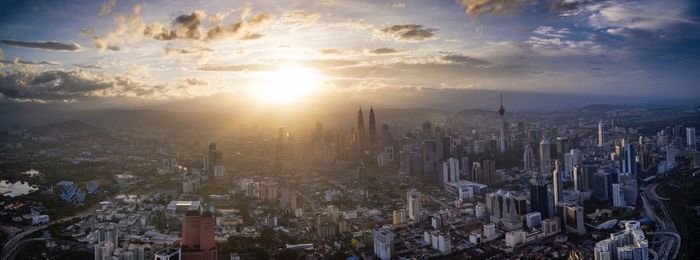 High angle view of cityscape against sky during sunset