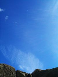 Panoramic view of landscape against blue sky