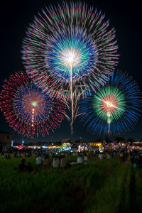 Firework display at night