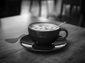 Coffee cup on table