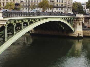 Arch bridge over river