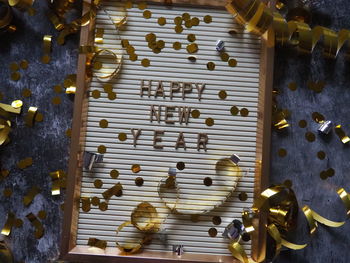 Gold themed happy new year on letter board