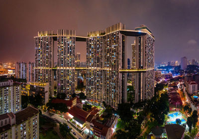 Aerial view of illuminated pinacle in singapore city at night