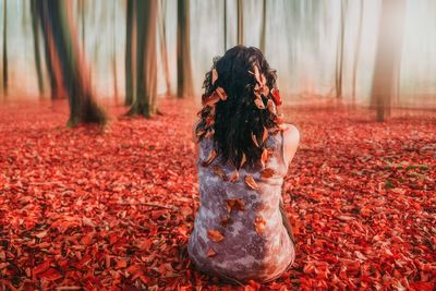 Woman standing in park during autumn