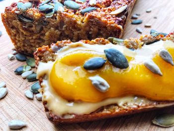 Close-up of cake slice on cutting board