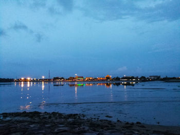 Scenic view of sea against sky at night