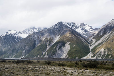 Scenic view of snowcapped mountains against sky