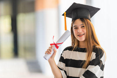 Portrait of smiling young woman