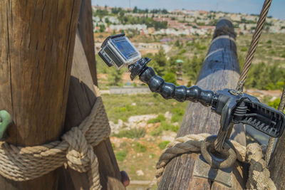 Close-up of camera on wood