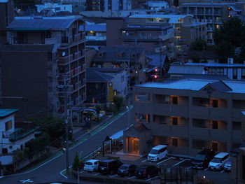 High angle view of illuminated cityscape