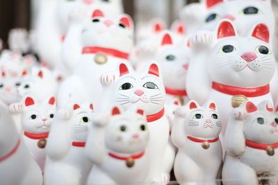 Close-up of cat figurines for sale in market