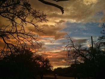 Scenic view of landscape against cloudy sky