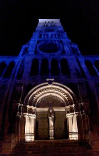 Low angle view of illuminated building at night