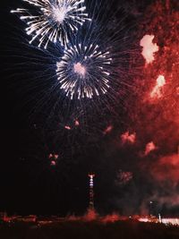 Firework display at night